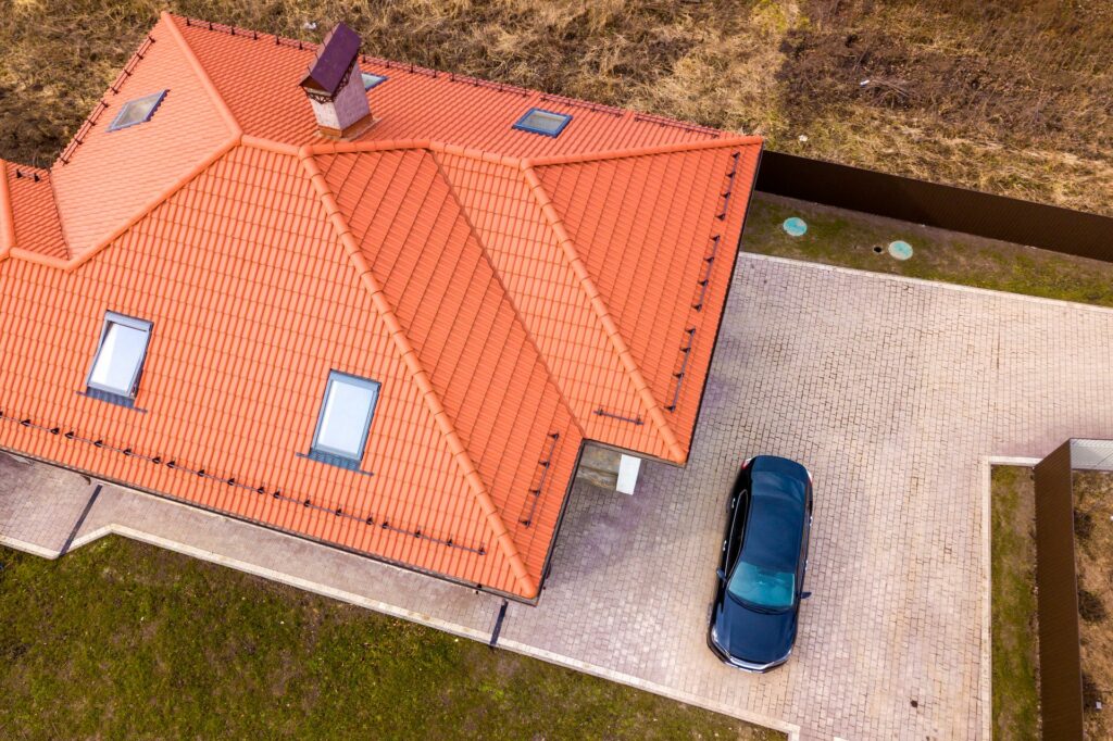 aerial-top-view-of-house-metal-shingle-roof-with-a-2022-09-07-18-46-31-utc (1)