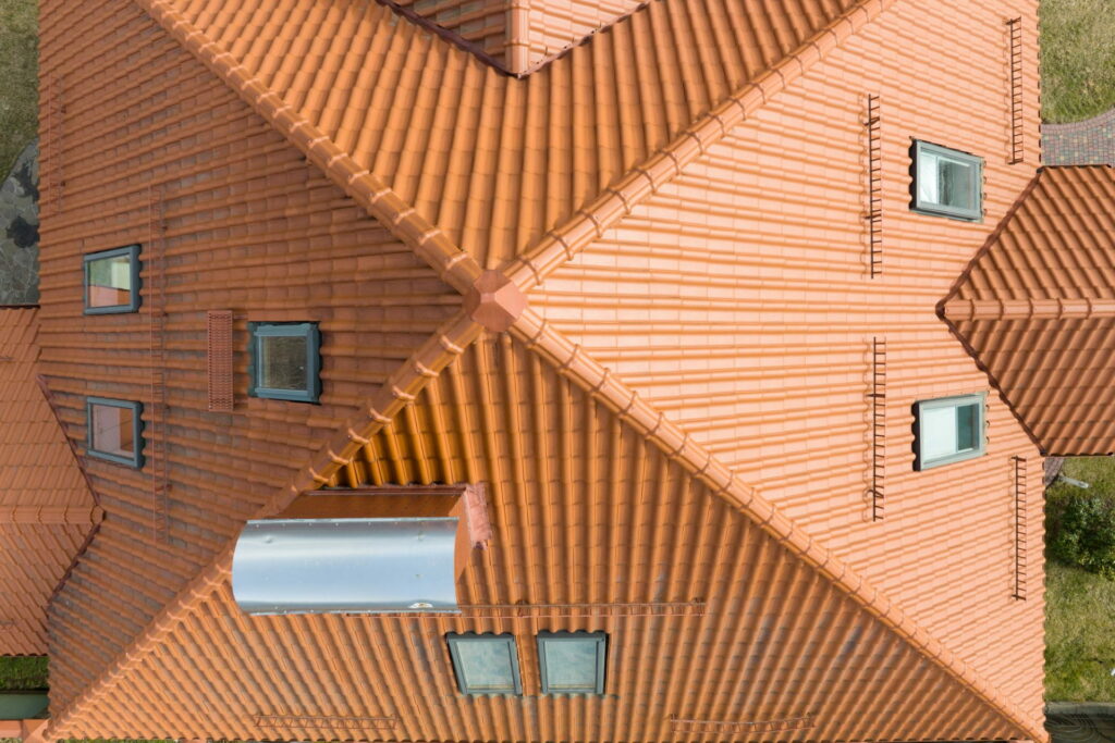 closeup-of-attic-windows-on-house-roof-top-covered-2022-07-06-00-20-50-utc (2) (1)